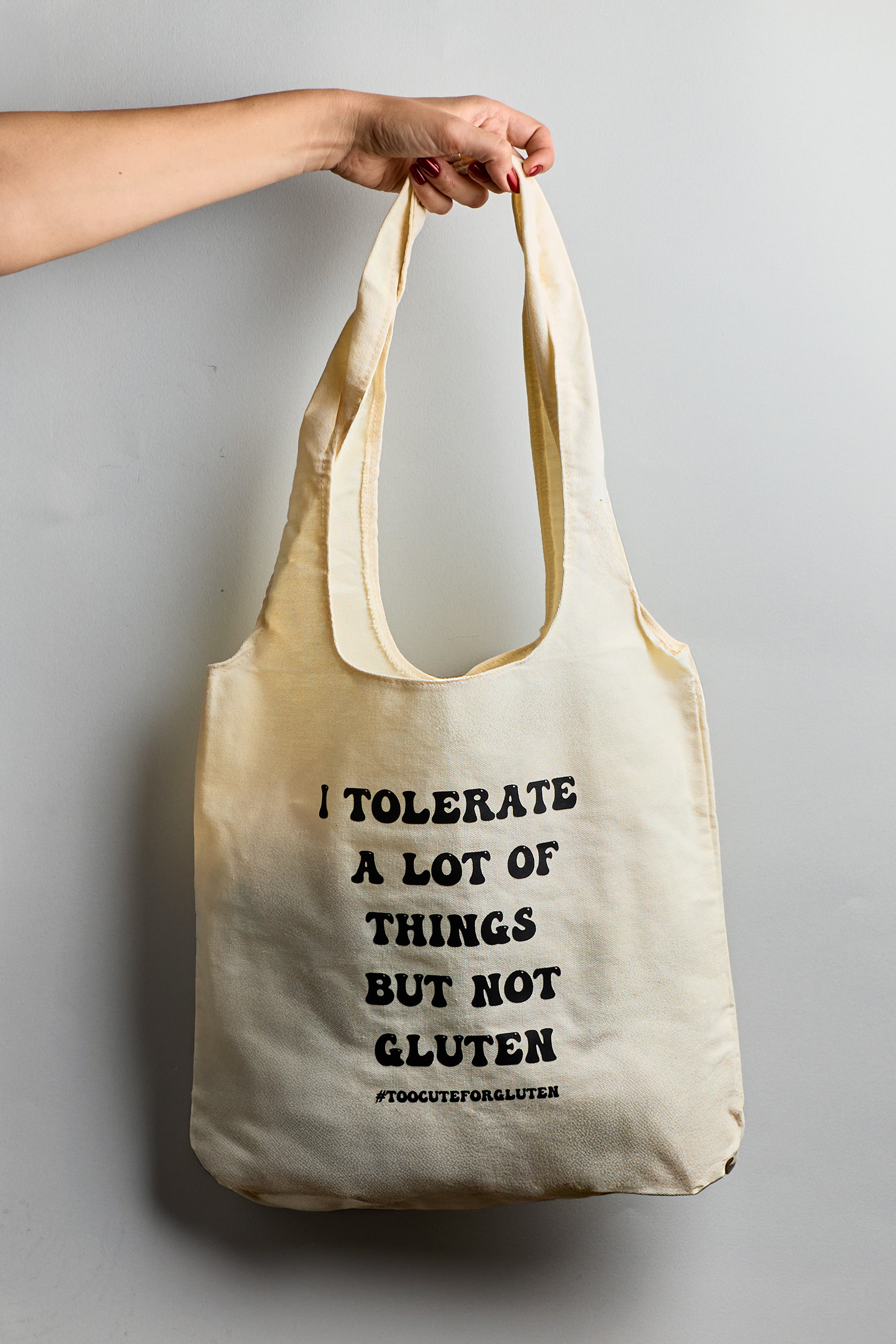 Béžová plátěná taška "I tolerate a lot of things but not gluten"